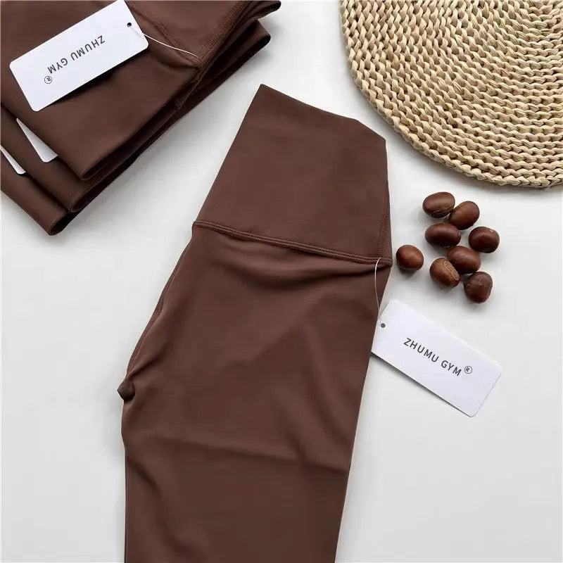 بنطلون رياضي نسائي بدون درزات عالي الخصر مرن سادة لممارسة اليوجا في صالة الألعاب الرياضية والركض سريع الجفاف بنطلون ضيق للنساء