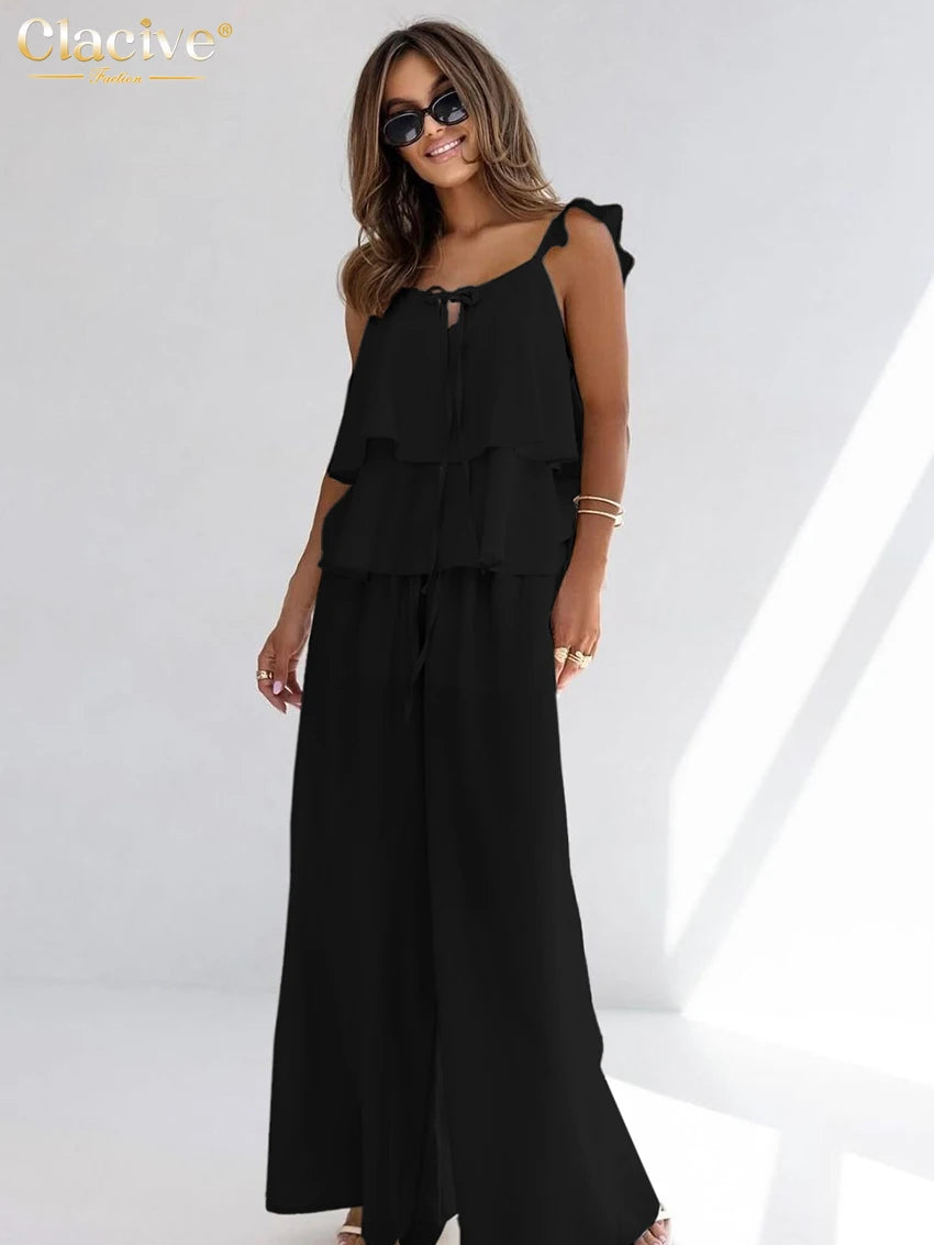 طقم نسائي من قطعتين من القطن الأبيض الفضفاض من Clacive صيفي 2025، مكون من بلوزة بدون أكمام مع بنطلون واسع وخصر مرتفع للنساء