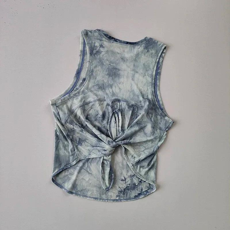 سترة رياضية نسائية سريعة الجفاف فضفاضة للجري والصالة الرياضية بدون أكمام جميلة الظهر وقميص شبكي وقميص قصير لليوغا