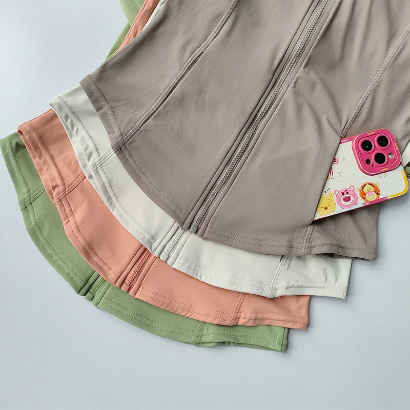 سترة يوجا نسائية بأكمام طويلة وقمصان رياضية بسحاب وقميص لياقة بدنية وغطاء رأس دافئ للشتاء وقميص رياضي ومعاطف للجري وملابس للتمرين