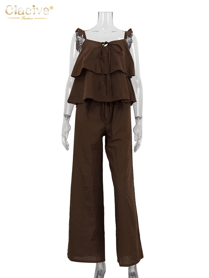 طقم نسائي من قطعتين من القطن الأبيض الفضفاض من Clacive صيفي 2025، مكون من بلوزة بدون أكمام مع بنطلون واسع وخصر مرتفع للنساء