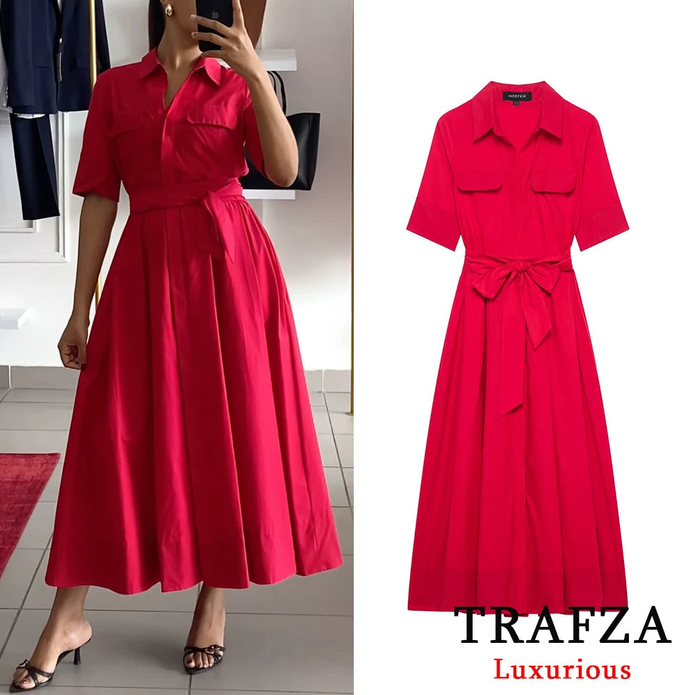 فستان أحمر طويل بحزام وجيوب، تصميم أنيق لربيع صيفي. 