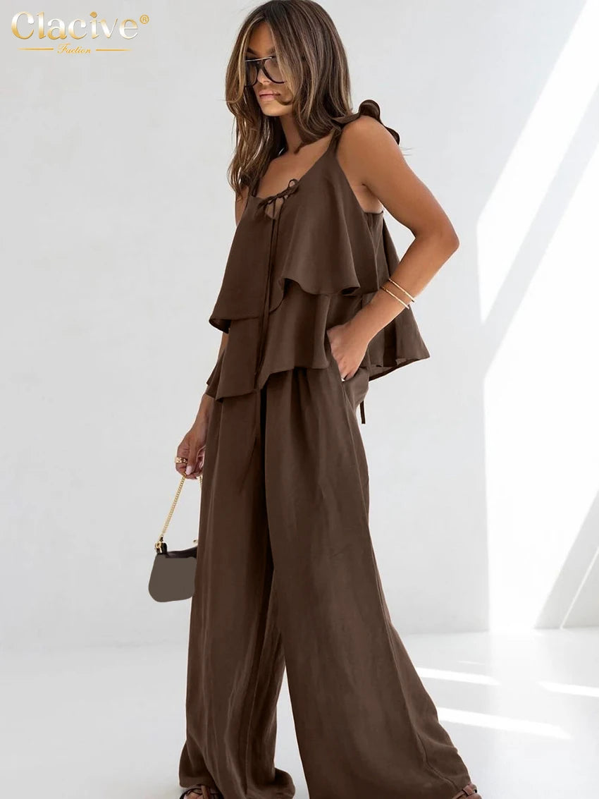 طقم نسائي من قطعتين من القطن الأبيض الفضفاض من Clacive صيفي 2025، مكون من بلوزة بدون أكمام مع بنطلون واسع وخصر مرتفع للنساء 